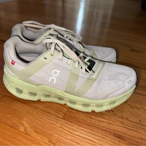 On Running Cream and Light Green Sneakers